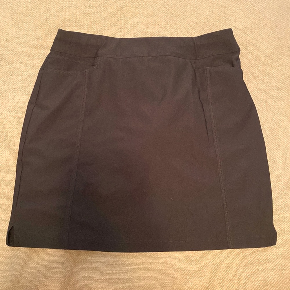 Small black Adidas skirt with pockets